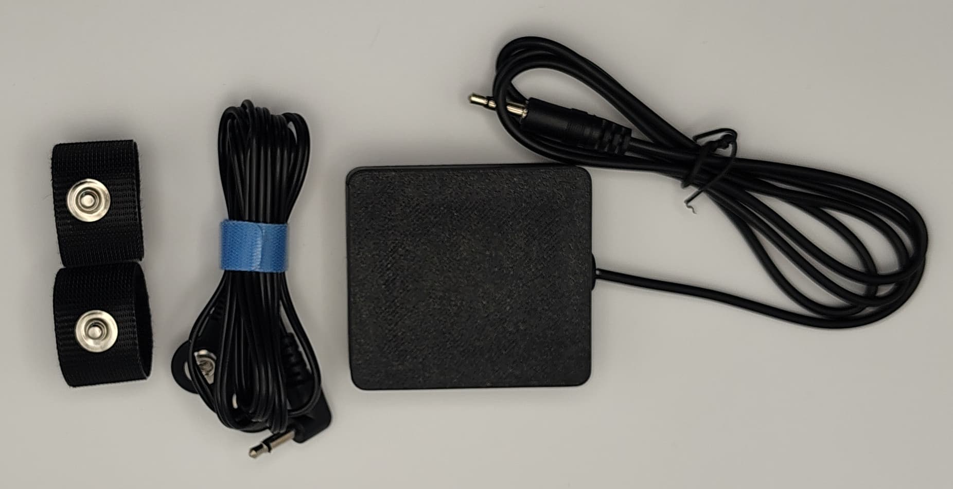 Alternate view of the ODAX EDA Standard Sensor Kit showing the two electrode contact surfaces, snap leads, enclosure, and TRS cable